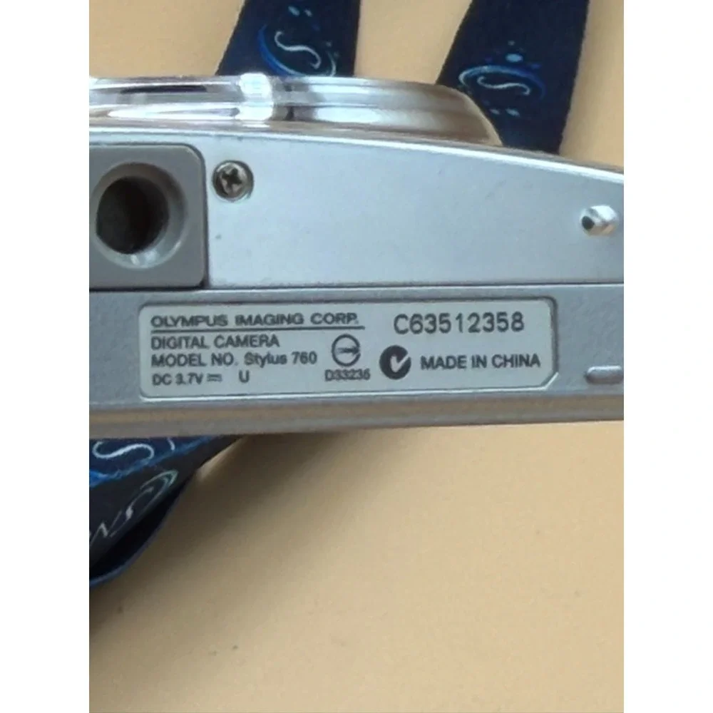 Olympus Stylus 760 7.1MP Digital Camera Silver Tested w/ Charger 1GB xD